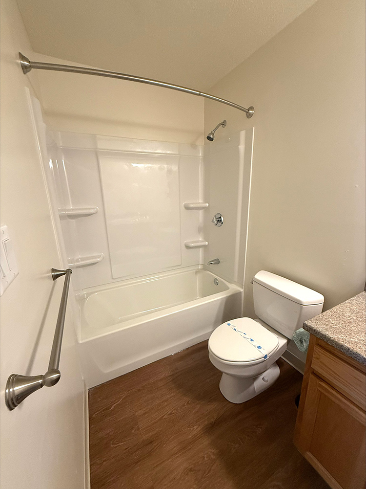 Townhouse gardens bathroom toilet and shower